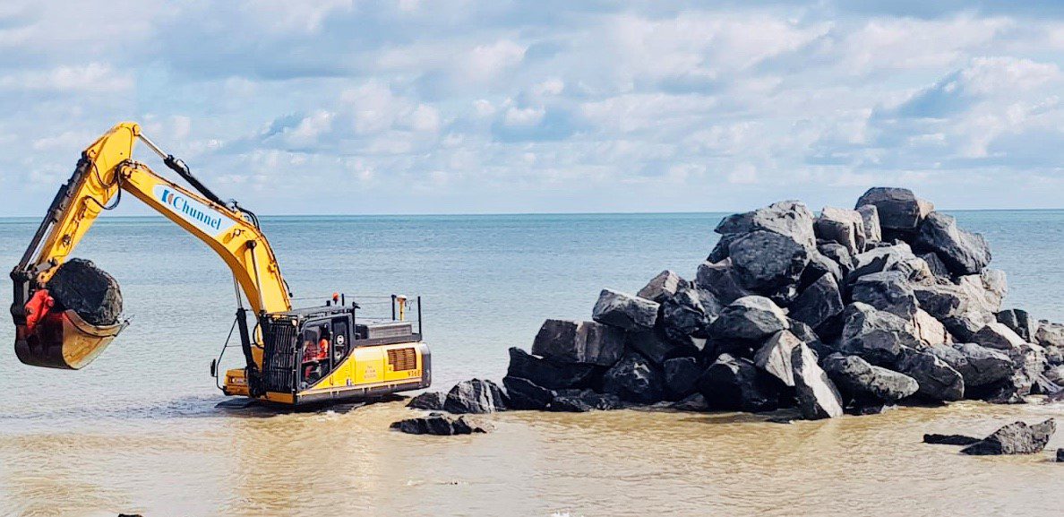Excavator in water